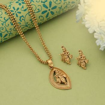 matte gold krishna pendant necklace set with earrings 1