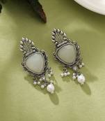 white alloy earrings with stone dangle design