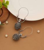 white alloy earrings with oxidised stone drop work
