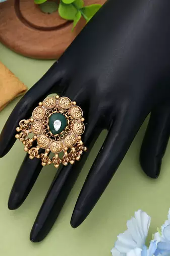 green alloy ring with gold plated stone design