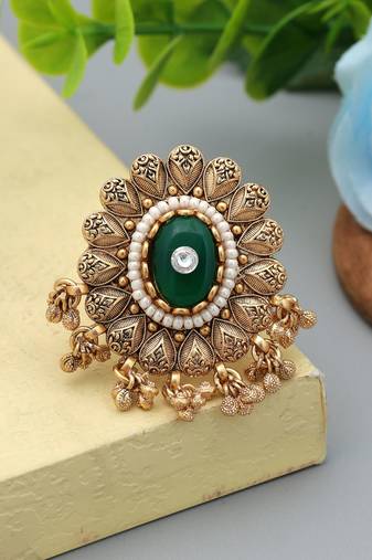 green alloy ring with yellow gold glass stone