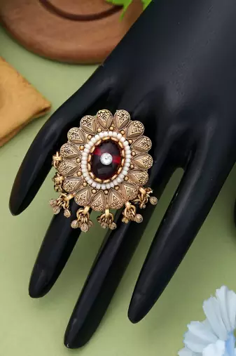 red alloy ring with glass stone design