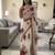 Off white and red floral organza saree