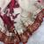 Off white and red floral organza saree