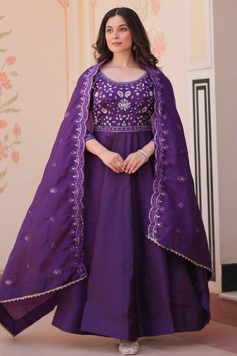 Purple color beautiful ceremonial gown for ethnic stylish looks