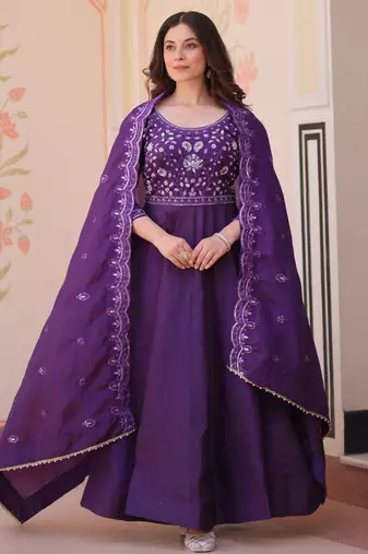 Purple color beautiful ceremonial gown for ethnic stylish looks