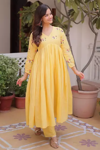 Yellow color cotton blended girlie top with bottom for rich girlie looks