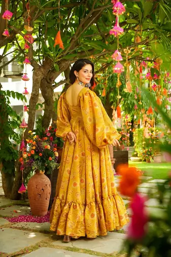 Mustard color trendy and stylish gown for looks