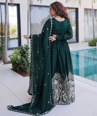 Green color rangoli crush embroidered heavy partywear gown 2