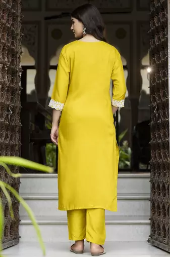 Yellow color beautiful looking rich party kurta set