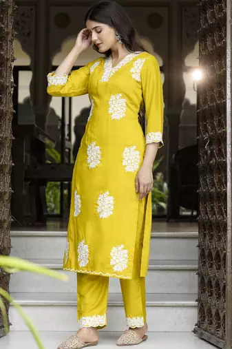 Yellow color beautiful looking rich party kurta set