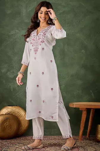 Off white color beautiful looking rich party kurta set