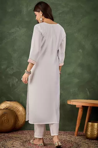 Off white color beautiful looking rich party kurta set
