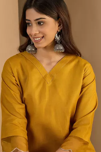 Yellow color beautiful looking rich party kurta set