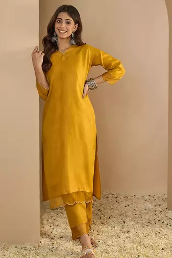 Yellow color beautiful looking rich party kurta set