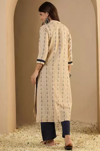 Beige color beautiful looking rich party kurta set