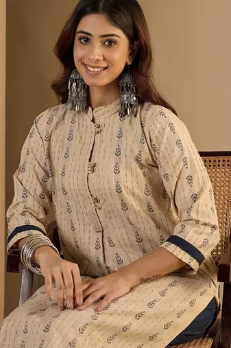 Beige color beautiful looking rich party kurta set