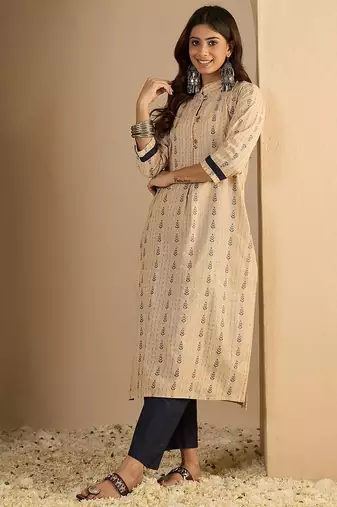 Beige color beautiful looking rich party kurta set
