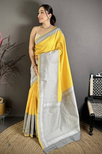Yellow soft silk intricate geomatric kanjivaram silver weaving saree