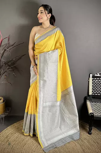 Yellow soft silk intricate geomatric kanjivaram silver weaving saree