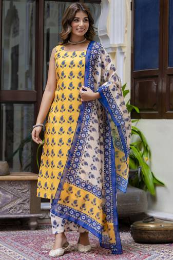 Yellow color cotton blended designer floral printed ethnic partywear suit
