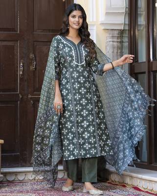 Green color cotton blended floral printed partywear suit 1