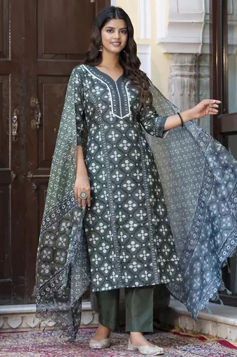 Green color cotton blended designer floral printed ethnic partywear suit