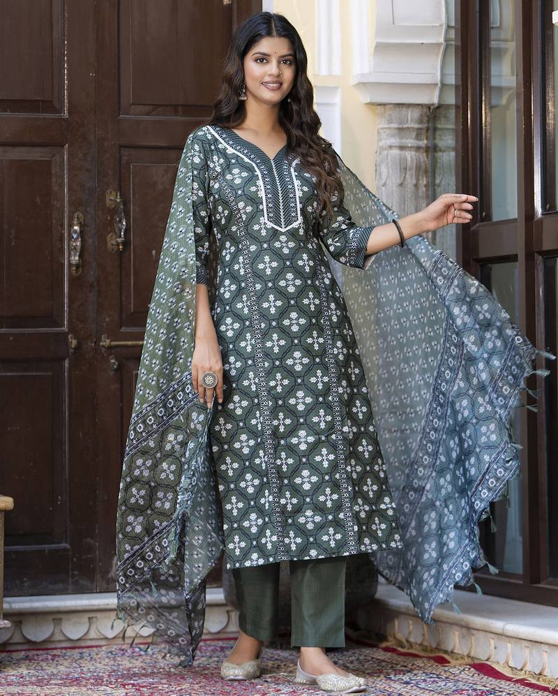 Green color cotton blended designer floral printed ethnic partywear suit