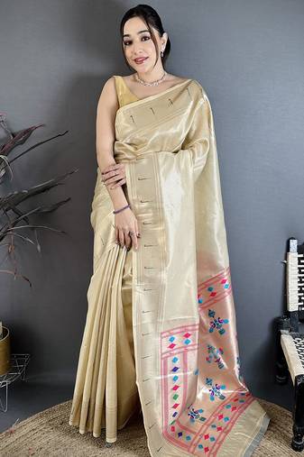 Beige tissue solid zari weaving paithani saree with muniya border