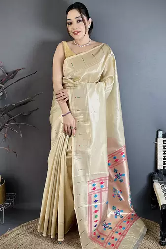 Beige tissue solid zari weaving paithani saree with muniya border
