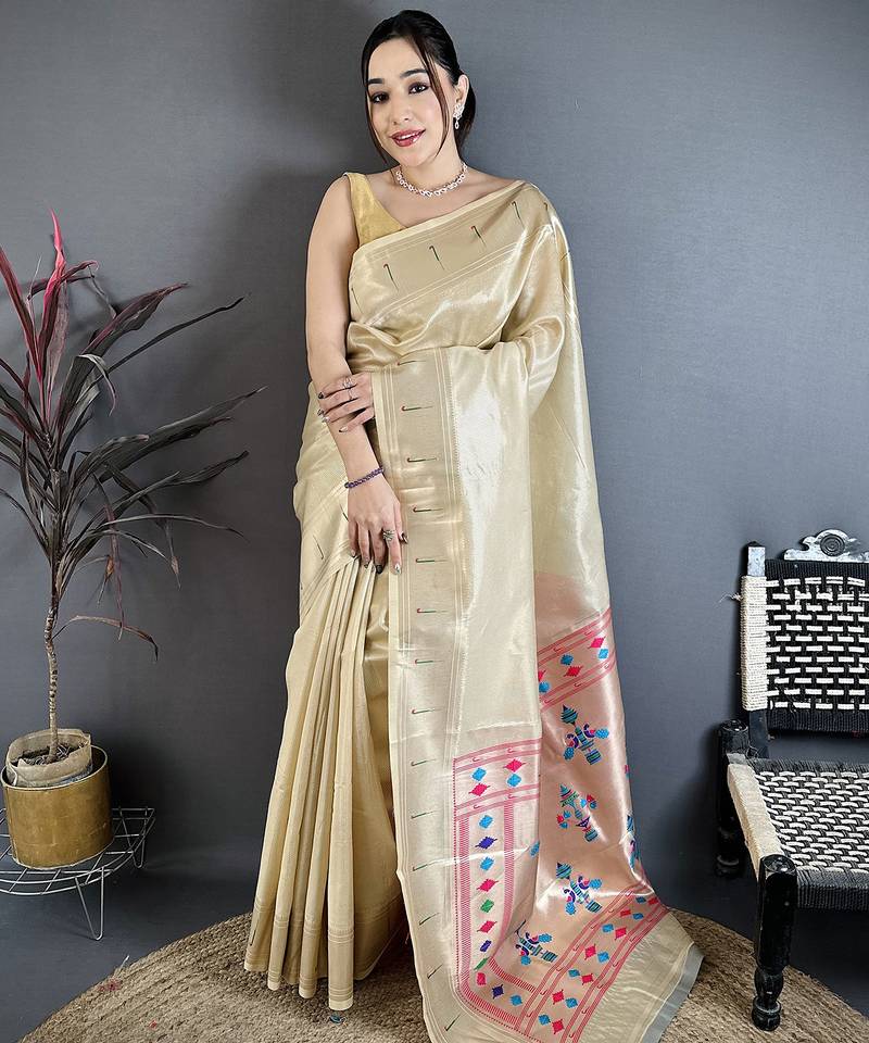 Beige tissue solid zari weaving paithani saree with muniya border