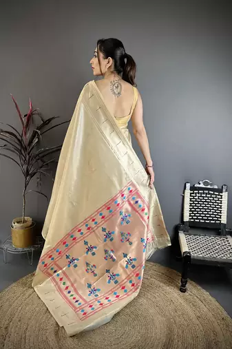 Beige tissue solid zari weaving paithani saree with muniya border