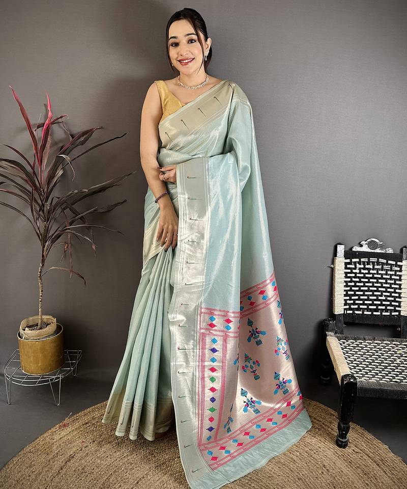 Light blue tissue solid zari weaving paithani saree with muniya border
