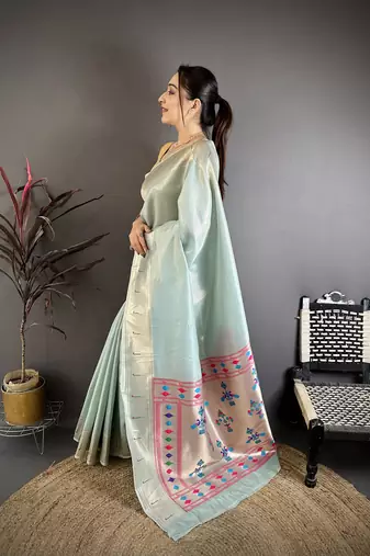 Light blue tissue solid zari weaving paithani saree with muniya border