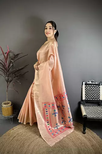 Peach tissue solid zari weaving paithani saree with muniya border