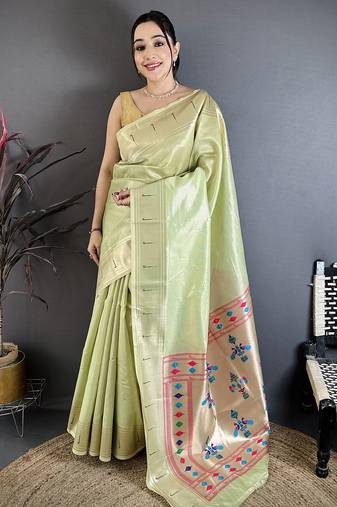 Light green tissue solid zari weaving paithani saree with muniya border