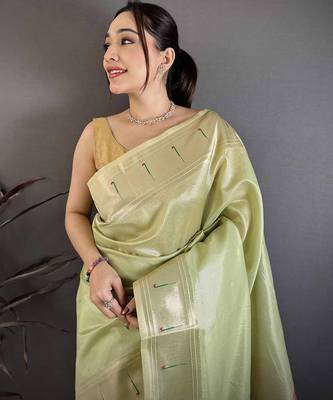 Light green tissue solid zari weaving paithani saree with muniya border 3