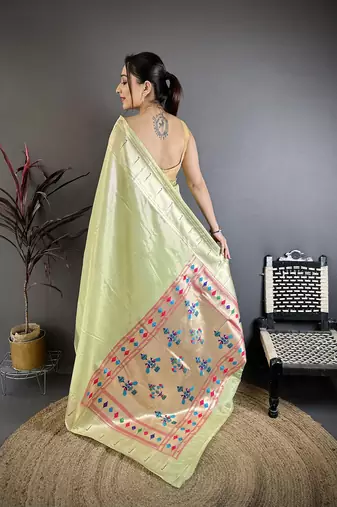 Light green tissue solid zari weaving paithani saree with muniya border