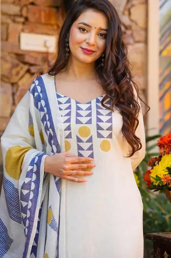 Cream color muslin stylish fancy kurta set for girls