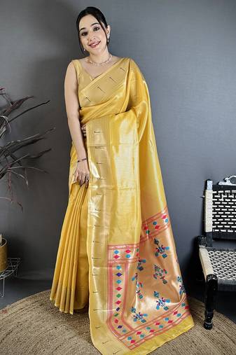 Golden yellow tissue solid zari weaving paithani saree with muniya border