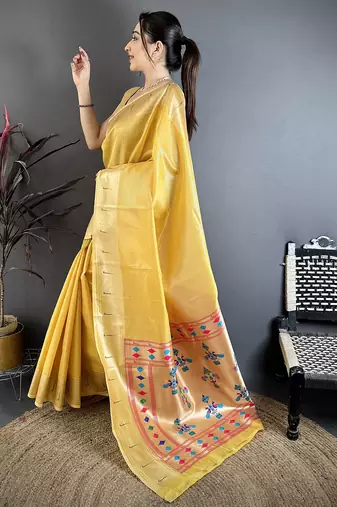 Golden yellow tissue solid zari weaving paithani saree with muniya border