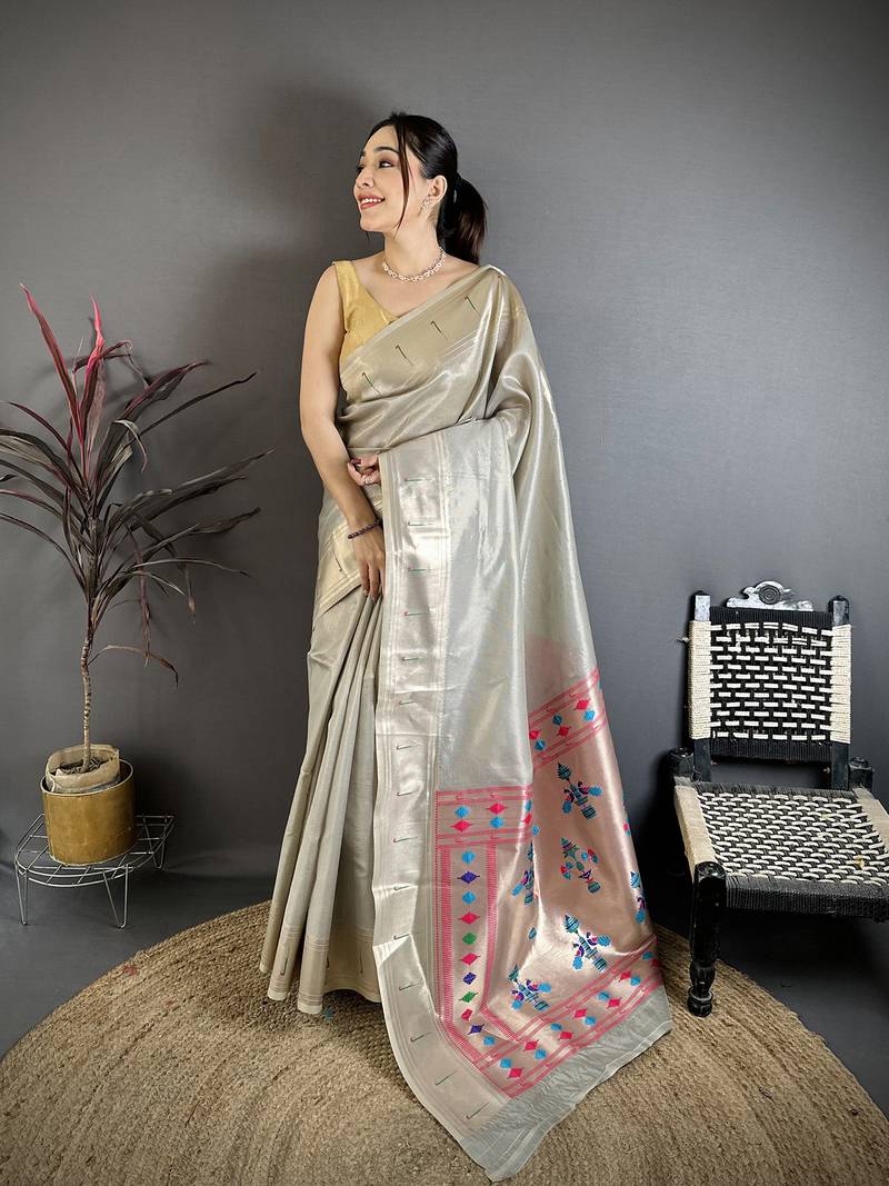 Grey tissue solid zari weaving paithani saree with muniya border