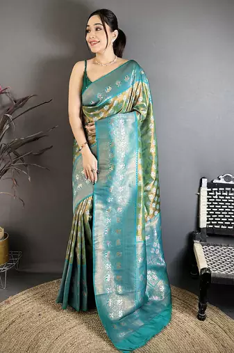 Teal green tissue silk floral pattern with copper motifs banarasi saree