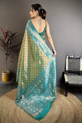 Teal green tissue silk floral pattern with copper motifs banarasi saree
