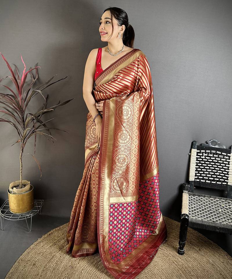 Maroon  soft silk geometric pattern zari weaving banarasi saree