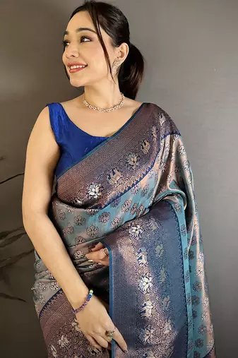 Blue tissue silk floral pattern with copper motifs banarasi saree