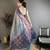 Blue tissue silk floral pattern with copper motifs banarasi saree