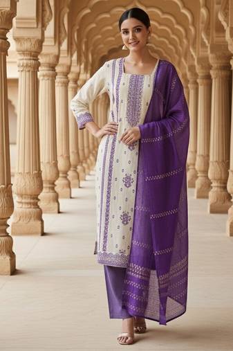 Off white color jaquard silk fabric designer ceremonial ethnic readymade suit