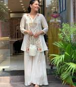 Cream color stylish trendy looking designer kurta set for stylish looks