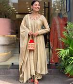 Beige color stylish trendy looking designer kurta set for stylish looks